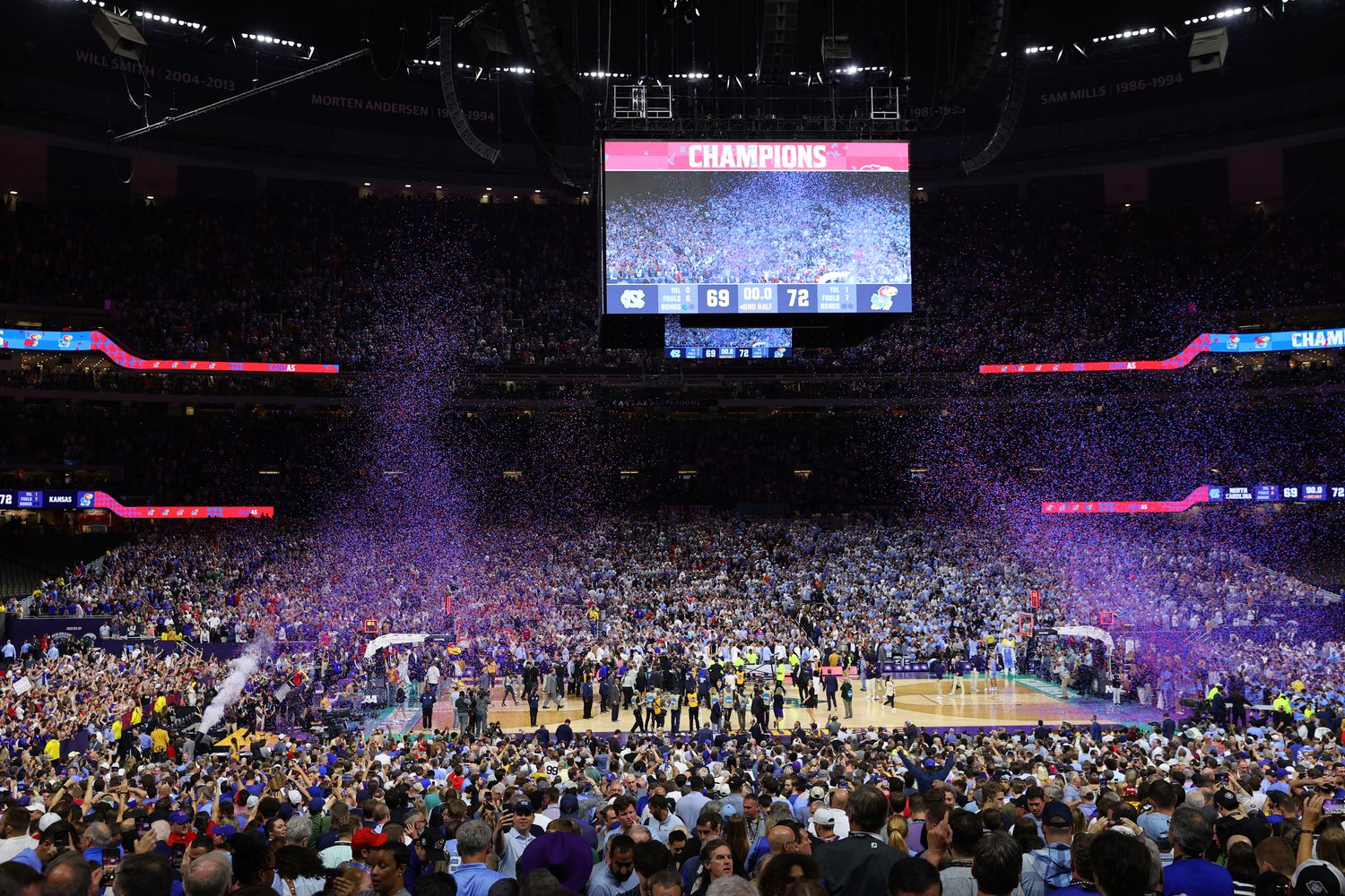 Apr 4, 2022; New Orleans, LA, USA; The Kansas Jayhawks celebrate after defeating the North Carolina Tar Heels during the 2022 NCAA men's basketball tournament Final Four championship game at Caesars Superdome. Stephen Lew-USA TODAY Sports